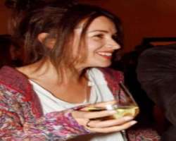 Amelia Warner consuming alcohol